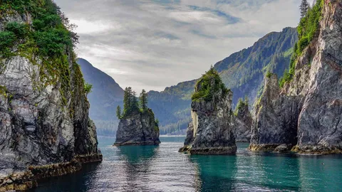 Picos escarpados e &aacute;guas selvagens