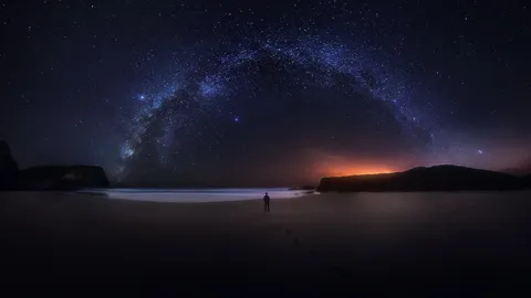 Un arc-en-ciel dans la nuit